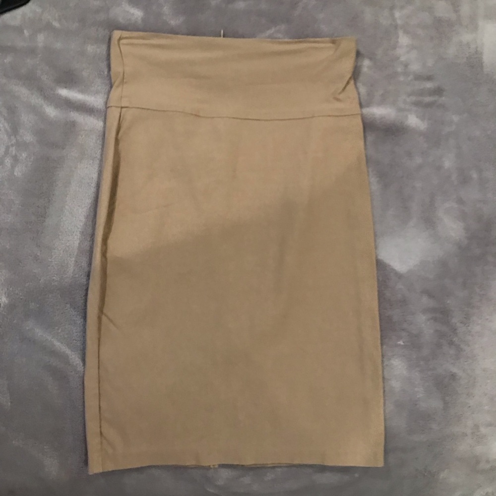 Beige pencil skirt with bow detailing in back